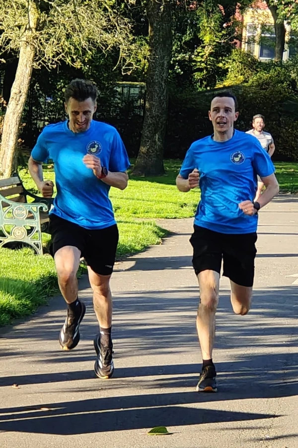 Clarence Runners members running through Clarence Park
